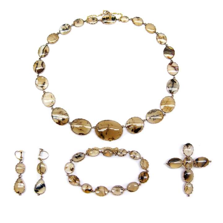Early 19th century moss agate and gold suite, comprising a necklace, pair of earrings, bracelet and a cross pendant-brooch